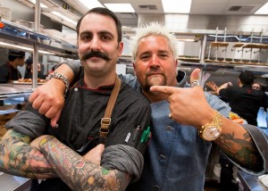  Guy Fieri poses with his executive chef, Tony Leitera,   Photo credit:     Erik Kabik.